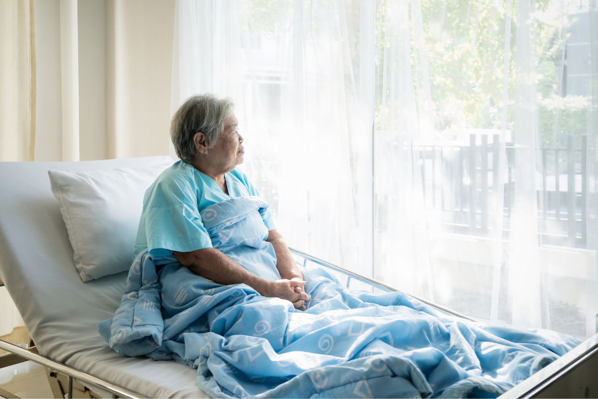 elderly woman in a nursing home facility